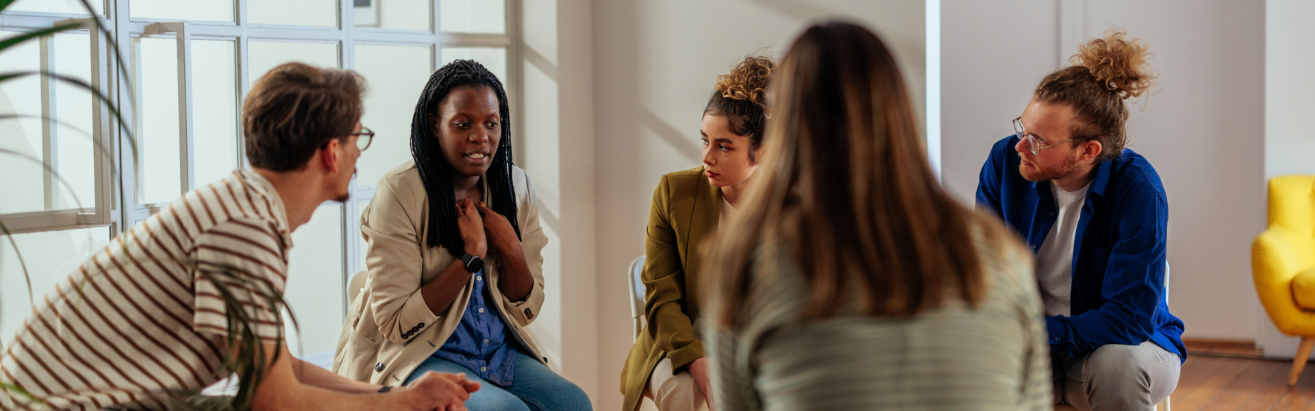 group of people having a therapy session
