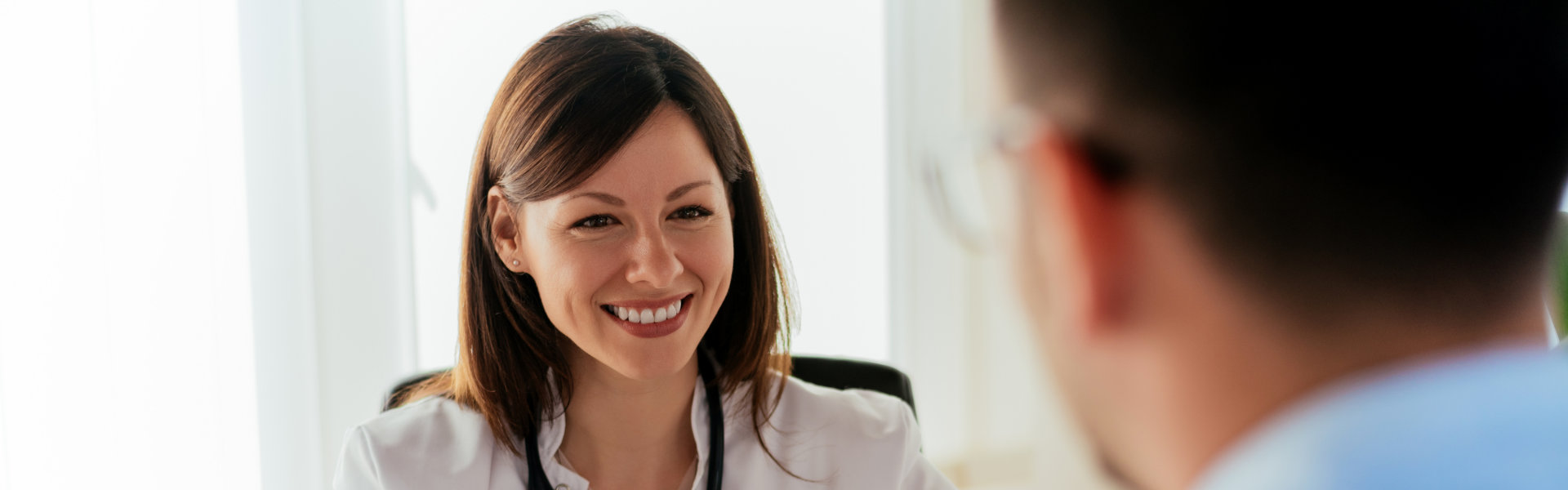 doctor smiling to patient